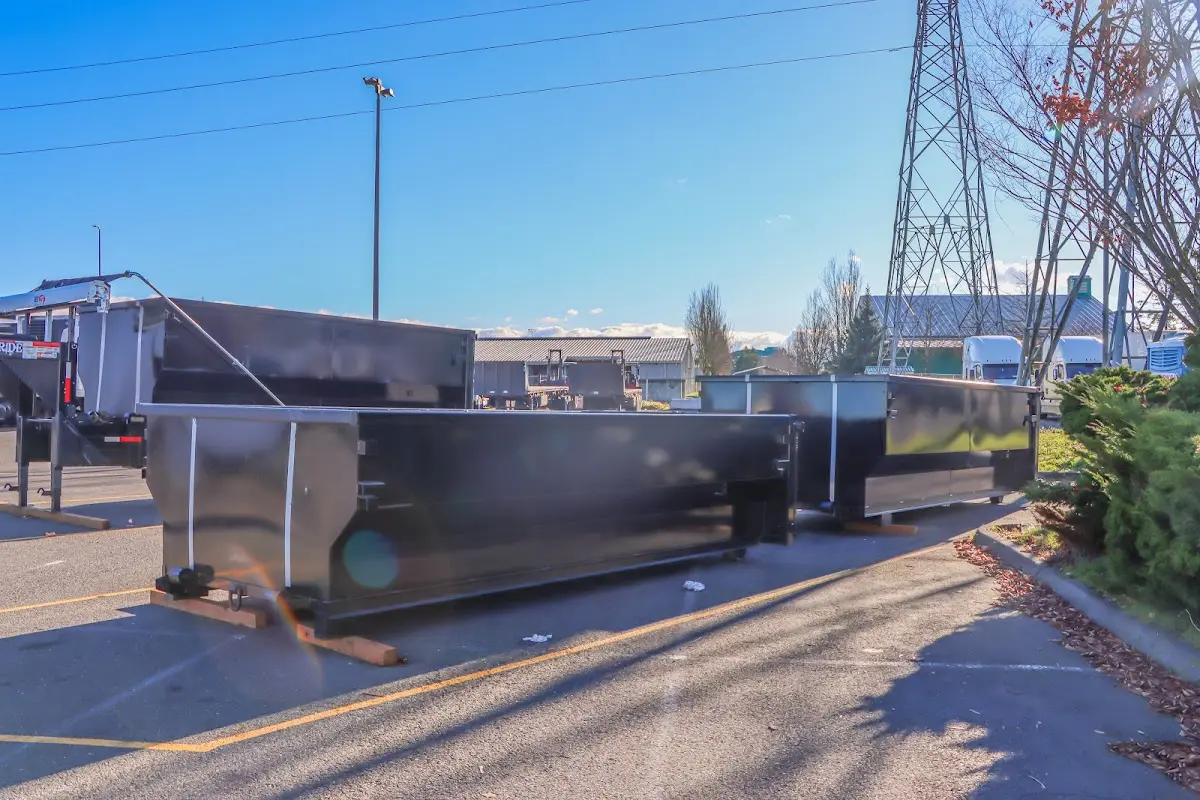 Roll-off dumpster ready for waste disposal at job site for 2 Yard Dumpster Rental in Laketon